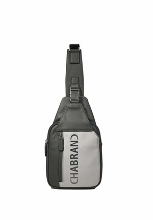 Borsa a tracolla bianca e nera con tasca frontale con cerniera e tracolla regolabile, con il marchio "CHABRAND" in verticale su pannello bianco.