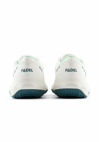 White athletic shoes with a textured, mint green heel counter and dark green outsole. "PADEL" logo printed on the heel.