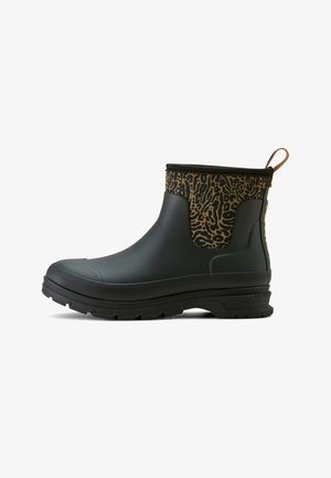 Black rubber ankle boot with a brown animal print upper, textured finish, and a pull tab at the back. Treaded black sole for grip.