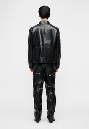 Rank 3: STUDIO ID - JUDE GLOSSED JACKET - Leather jacket