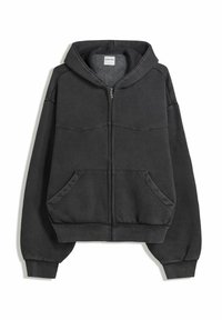 Schwarze Reißverschluss-Hoodie aus weichem Stoff, mit gefütterter Kapuze, Fronttaschen und elastischen Bündchen und Saum. Einfaches Design mit minimalen Nähten.