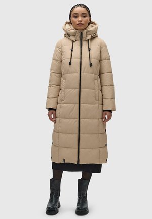 Beige padded long coat with a hood, featuring a front zipper, drawstrings, and snap button accents. Made from smooth, insulated material.