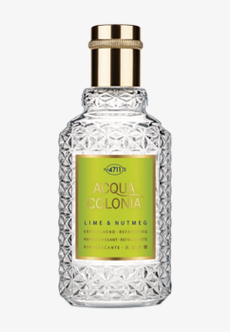 Flacon de parfum en verre clair et texturé avec un bouchon doré et une étiquette vert citron portant l'inscription "Acqua Colonia Lime & Nutmeg"