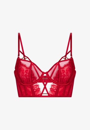 Rode kant bralette met doorzichtige panelen, verstelbare satijnen banden en geometrische uitsparingen. Kenmerkt zich door een gestructureerd ontwerp en een haaksluiting.
