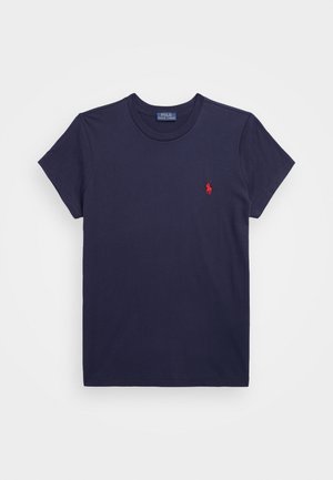 T-shirt en coton bleu marine à manches courtes et col rond. Présente un petit logo brodé rouge sur la poitrine à gauche.