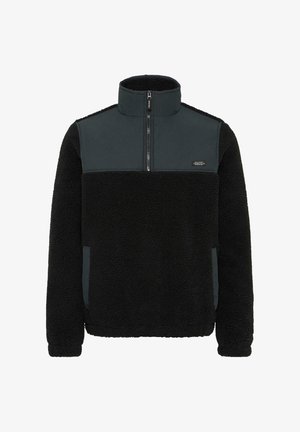 Bélény pulóver magas gallérral, fekete bolyhos textúrával, sima sötétszürke anyaggal a vállrészen és félig cipzáros elülső zárással.