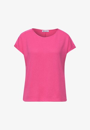 Hellrosa kurzärmlige Bluse mit rundem Halsausschnitt und lockerem Schnitt, aus glattem Stoff mit kleinem Markenlabel am Kragen.