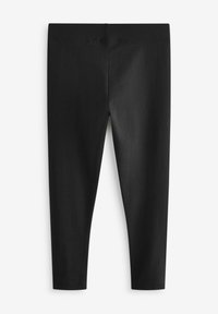 Leggings neri realizzati in un tessuto elasticizzato, caratterizzati da una texture liscia e un design semplice con una vita elasticizzata. Nessuna cucitura o motivo visibile.
