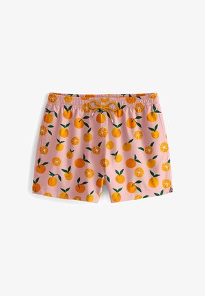 Roze zwemshorts met een herhaald patroon van sinaasappels en sinaasappelplakken, met groene bladeren. Elastische tailleband met een gele trekkoord.