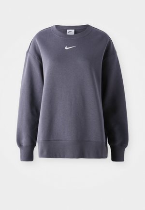 Tmavě šedá mikina s dlouhými rukávy, kulatým výstřihem, žebrovaným lemem a bílým logem Nike na hrudi, vyrobená z měkké směsi bavlny.