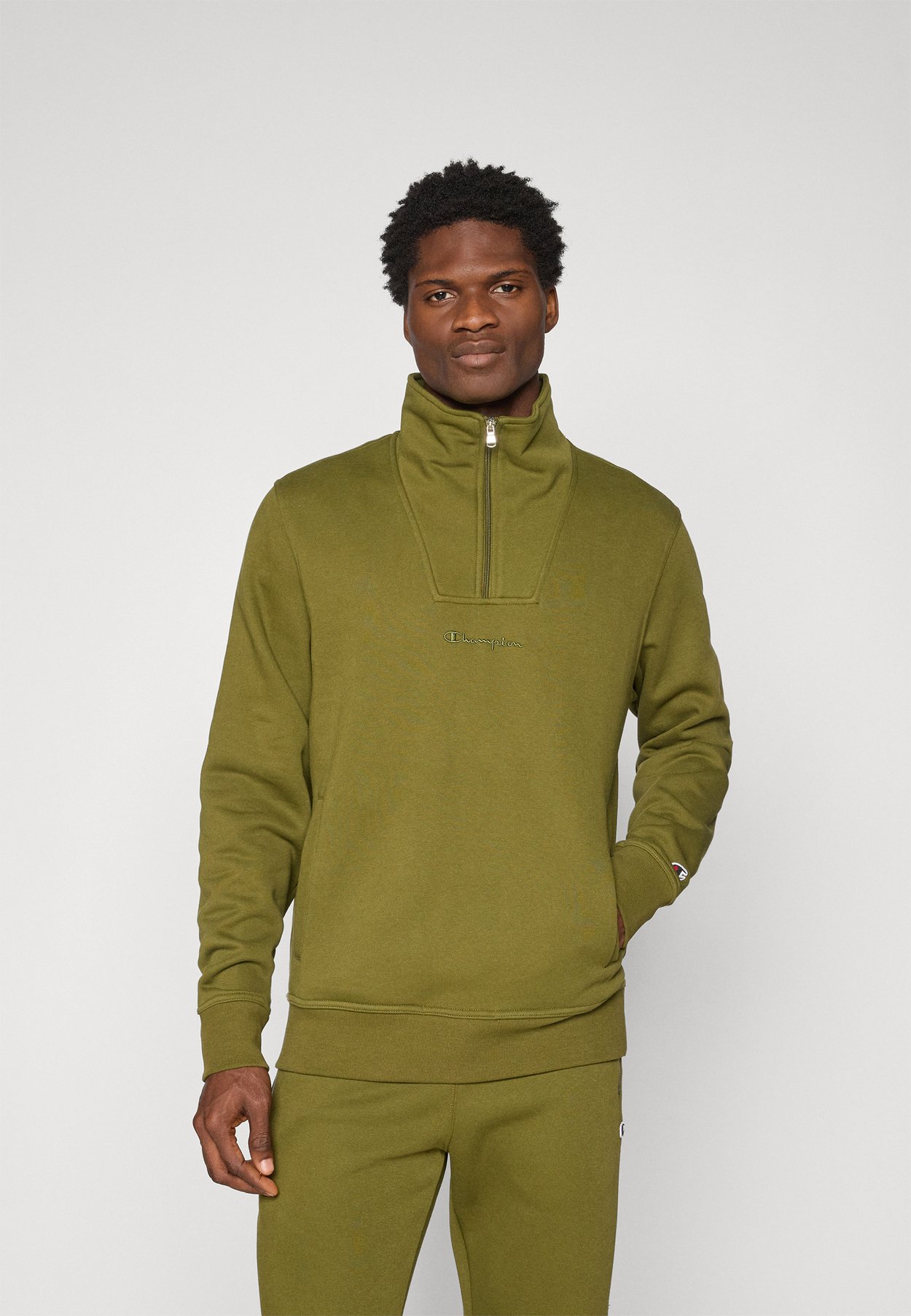 ICONS TONAL HALF ZIP SMALL LOGO