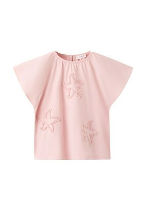 Blouse rose clair à manches courtes avec encolure ronde, ornée de trois appliqués en forme d'étoiles de mer texturées sur le devant.