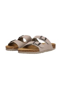 Helle beige Sandalen mit zwei verstellbaren Riemen und silbernen Schnallen. Korkfußbett und strukturierte, flexible Gummisohle mit natürlicher Oberflächenbeschaffenheit.