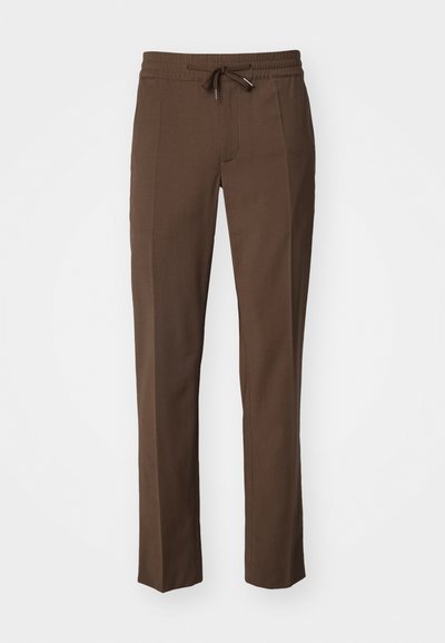 Bakerice hlače z elastičnim pasom, ozkimi nogami in gladko teksturo, z ravnim sprednjim delom in brez vidnih žepov.