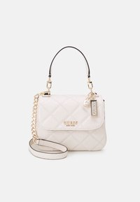 Kreemi tikattu käsilaukku kultaisilla metalliosilla, irrotettavalla ketjuhihnalla ja metallilogo-tunnisteella. Varustettu luukun sulkemisella ja sileällä pinnalla.