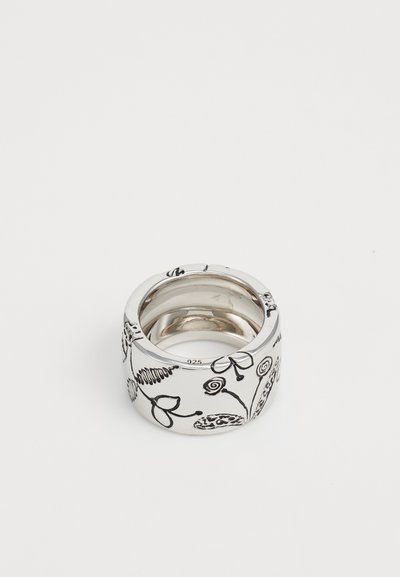 Silver band ring with engraved black floral and abstract patterns, marked 925 inside, on plain white background.