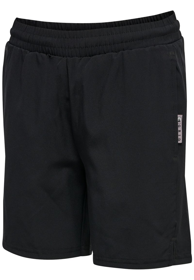 Pantaloni sportivi neri realizzati in tessuto leggero. Presentano un elastico in vita e una piccola etichetta del marchio di lato. Texture liscia.