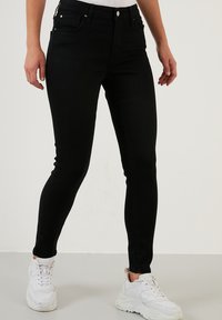 LELA Uske traperice - black black