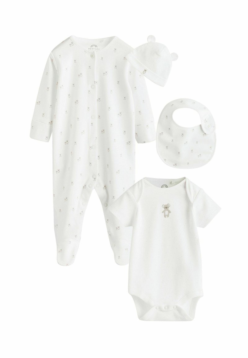White baby clothing set including a long-sleeve onesie, short-sleeve bodysuit, bib, and hat, with bear patterns and soft material.