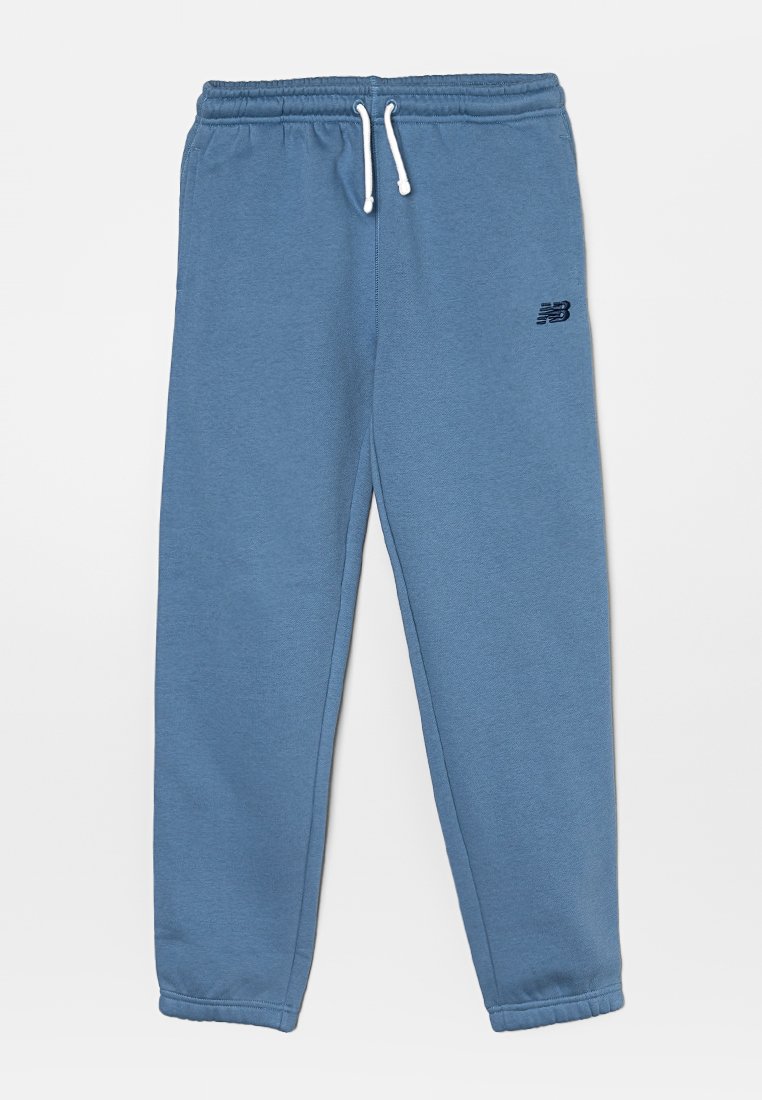 Blauwe trainingsbroek van zacht materiaal, met een elastische tailleband met een trekkoord, geribbelde boorden en een geborduurd logo in donkerblauw.