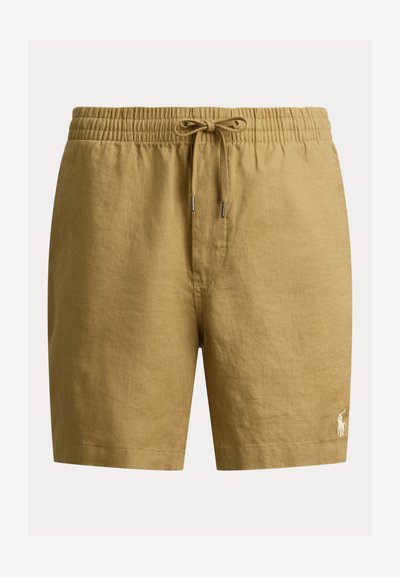 Κίτρινα λινά σορτς με ελαστική μέση και κορδόνι. Διαθέτουν μικρό κεντητό λογότυπο στο κάτω αριστερό πόδι. Ομαλή υφή.