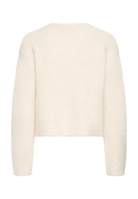 Maglione a maglia morbido di colore crema, con design corto, scollatura rotonda e maniche lunghe. Texture morbida e costruzione senza cuciture.