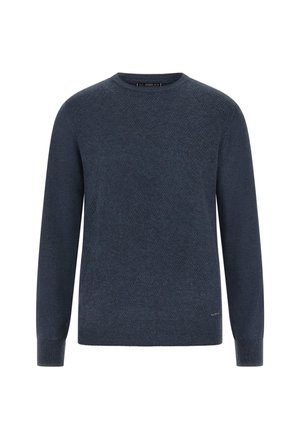 Tume sinine sviiter, ümmarguse kaelusega, tekstuurse kühmupatriikiga, ribatud varrukate ja äärega. Valmistatud pehmest kudumist materjalist.