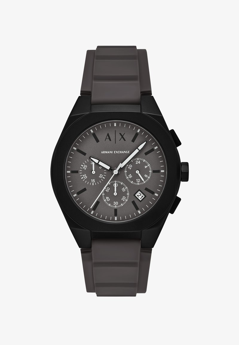 Zwarte chronograafhorloge met een grijze wijzerplaat, witte uurwijzers en datumweergave. Siliconen armband met een gestructureerde afwerking en een hoekig kastontwerp.