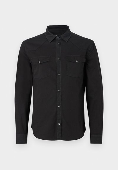 Black long-sleeve shirt with a button front, two chest pockets, and a pointed collar. Made of cotton fabric with a smooth texture.