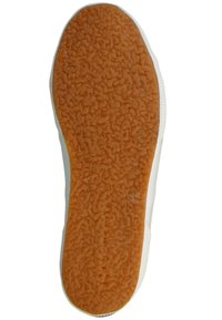 Suola in gomma per sneaker, texture ondulata, di colore arancione, progettata per grip e durata.