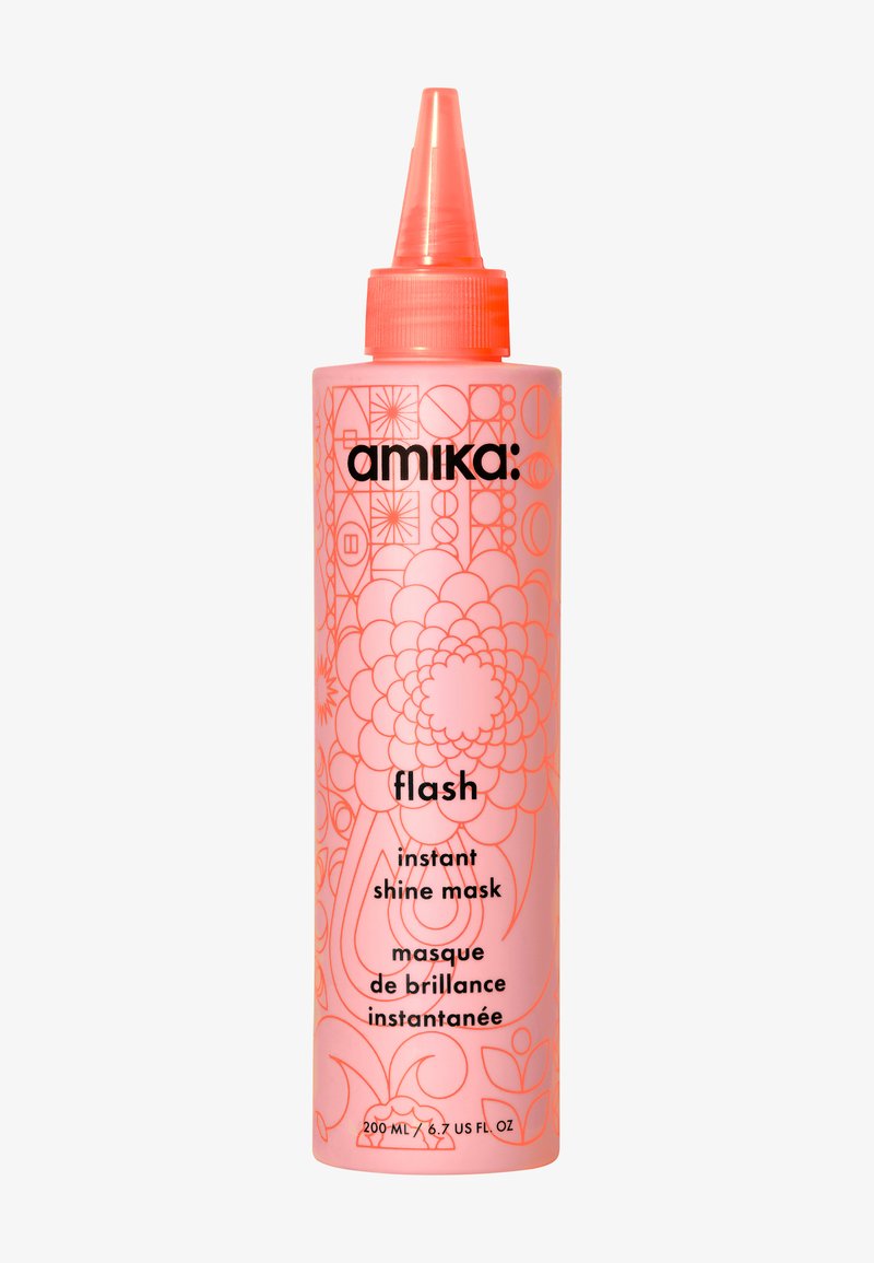 Bouteille en plastique rose avec un bouchon pointu orange, ornée de dessins linéaires complexes et d'un texte noir indiquant "flash instant shine mask".