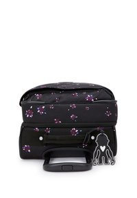 Black suitcase with floral print, textured fabric, retractable handle, top zipper compartment, and a heart-accented tag.
