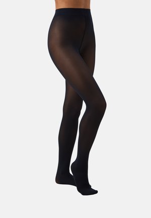 Medias negras transparentes con una textura suave, cinturilla alta y punta reforzada, diseñadas para un ajuste ceñido desde la cintura hasta el tobillo.