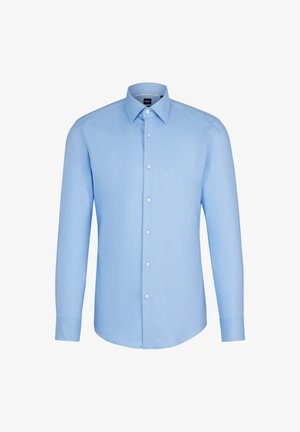 Light blue dress shirt made of cotton, featuring a classic collar, long sleeves, and a front placket with white buttons.
