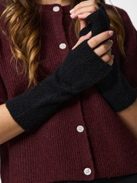 Black knitted fingerless gloves, soft texture, with a snug fit. Worn with a burgundy ribbed cardigan featuring white buttons and a rounded neckline.