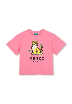 T-shirt rose à manches courtes avec une illustration de tigre de dessin animé au-dessus du texte « KENZO PARIS » sur le devant.