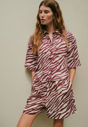 Next, Blusa - red ecru zebra print