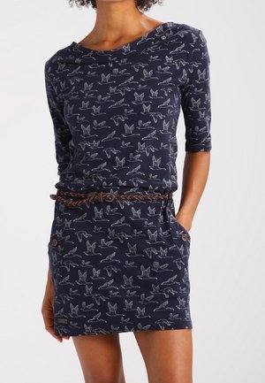 Navy dress with bird print, three-quarter sleeves, boat neckline, belted waist, and side pockets. Smooth fabric with a fitted silhouette.