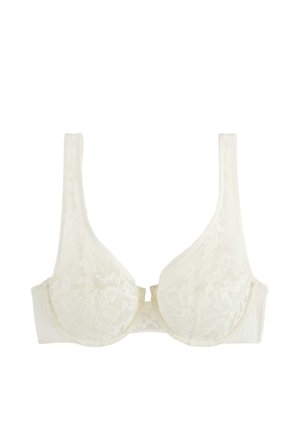 Soutien-gorge crème en dentelle avec armatures, bretelles réglables et motif floral sur les bonnets, posé à plat sur un fond blanc.