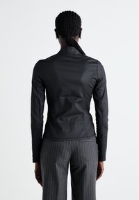 Weekday KATE COATED ZIP SHIRT - Bluza - black