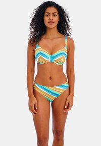 Bikini-setti, jossa kuvioitu yläosa ja alaosa. Materiaali on sileä, värit sisältävät sinisiä, keltaisia ja oransseja raitoja. Säädettävät hihnat.