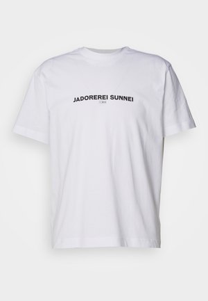 White cotton t-shirt featuring a crew neck and short sleeves. The front displays the text "JADOREREI SUNNEI" in bold black letters.