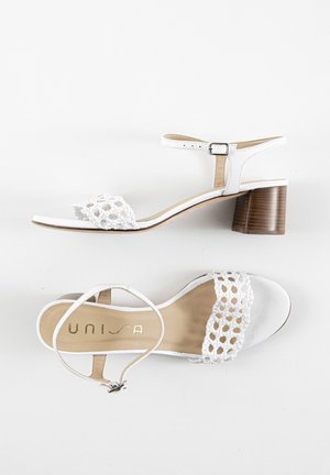 High heeled sandals - white