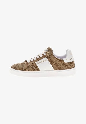 Brown canvas sneakers with a patterned design, white accents, gold logo detail, and white rubber sole. Classic lace-up style.