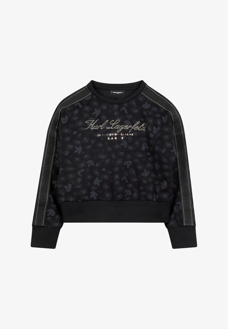 Sweat-shirt noir en tissu texturé et à motifs. Présente des broderies dorées et des accents latéraux contrastants. Design court avec un ourlet côtelé.