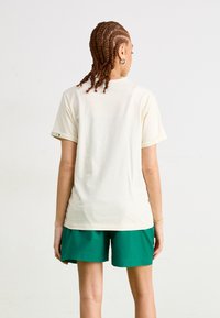 The North Face EASY WIND - Šortky - evergreen