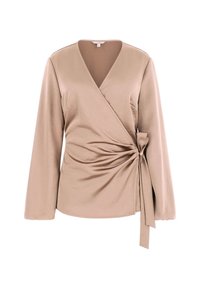 Top beige avvolgente realizzato in tessuto liscio, con maniche lunghe, scollatura a V, arricciature laterali e chiusura con fiocco lateralmente.