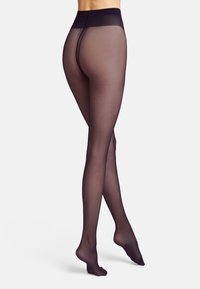 Durchsichtige schwarze Strumpfhosen mit einem hohen Bund, glatter Textur und nahtlosem Design, die die Beine bedecken und am Knöchel enden.