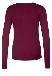 Maglione bordeaux a maniche lunghe, design aderente con collo rotondo. Realizzato in materiale morbido, presenta polsini e orlo a costine, texture liscia.