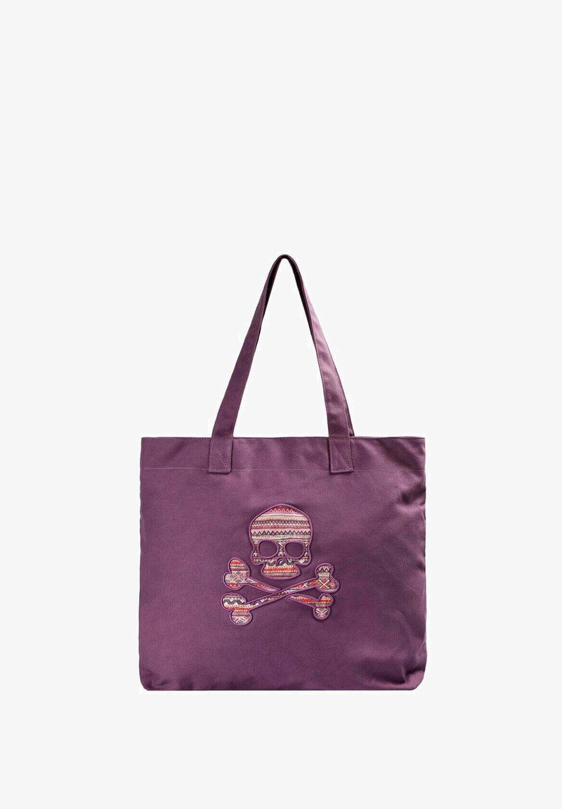 Sac en toile violet avec un grand design de skull et os croisés brodé, arborant des motifs colorés et des sangles épaules robustes.